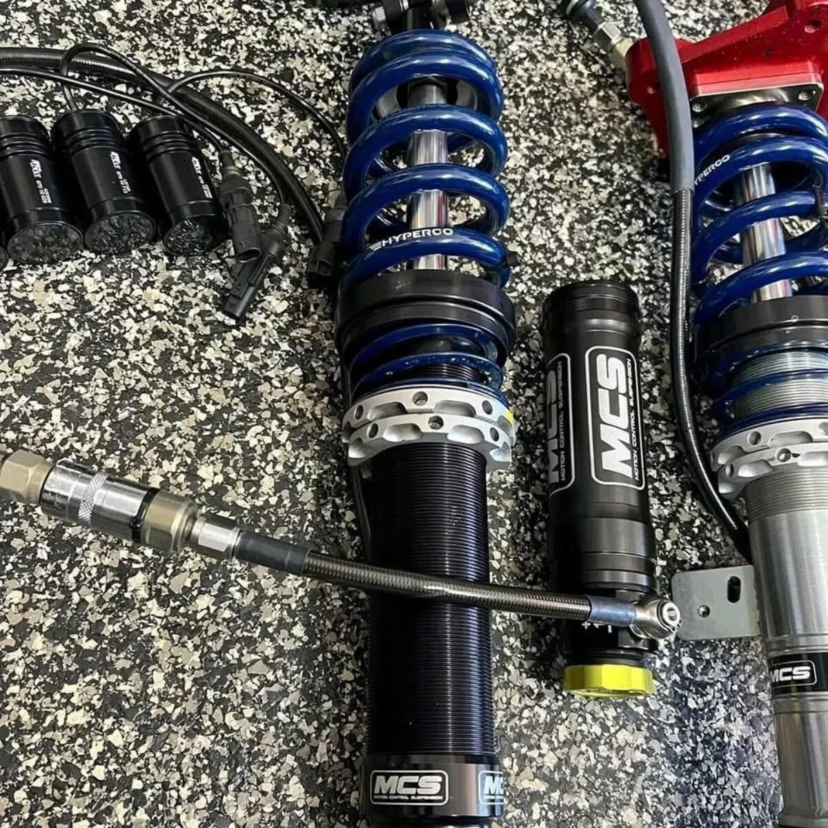 BMW G87 MCS 2- way coilover with front camber plates, quick disconnect resi, KW OEM suspension cancelation modules and SPL arm. Suspension has 13 track events, comes with extra set of spring rayes
